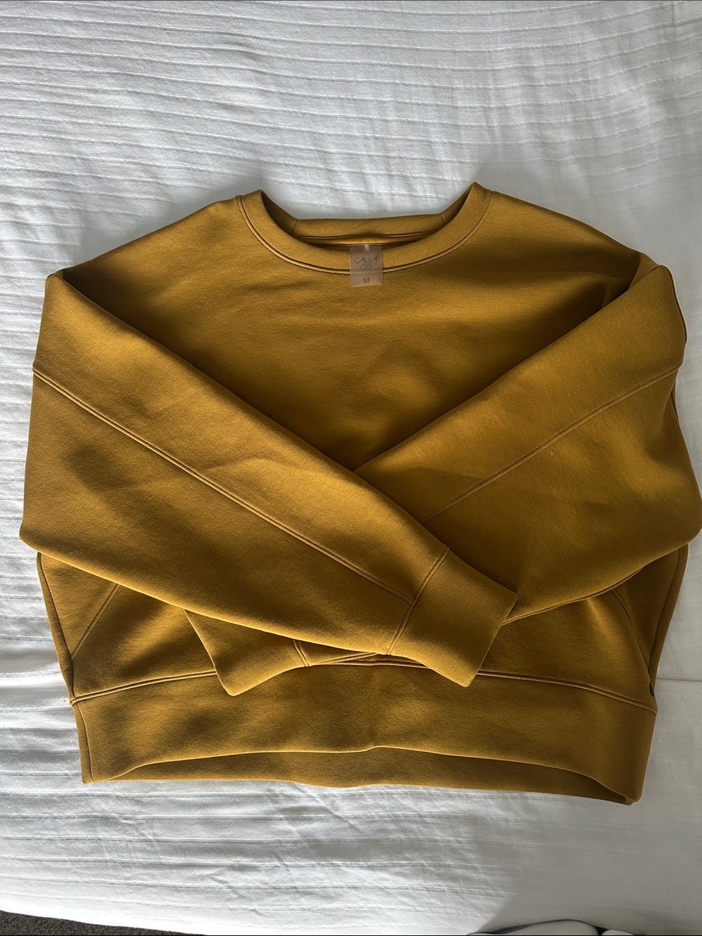 CALIA by Carrie Underwood Women's Crewneck Sweatshirt in Mustard Gold